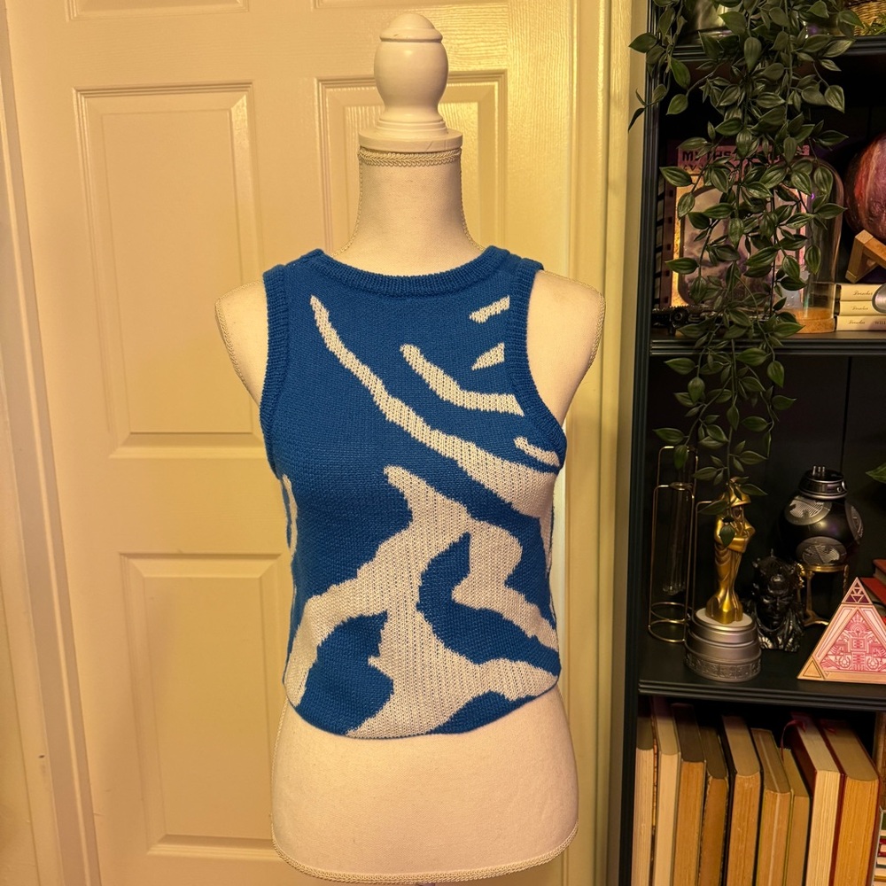 Snippy woven vest